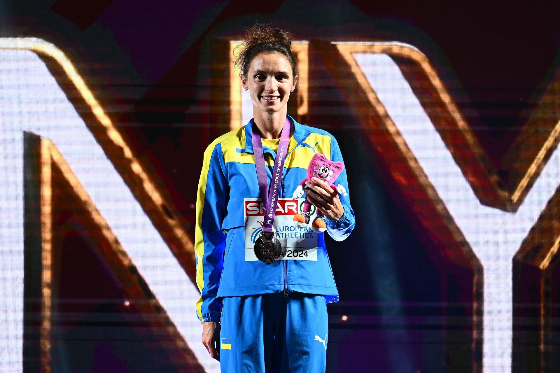 Lyudmila Olyanovska with her 20 km walk bronze medal